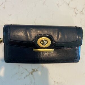Coach Black Leather Clutch with Gold Accents